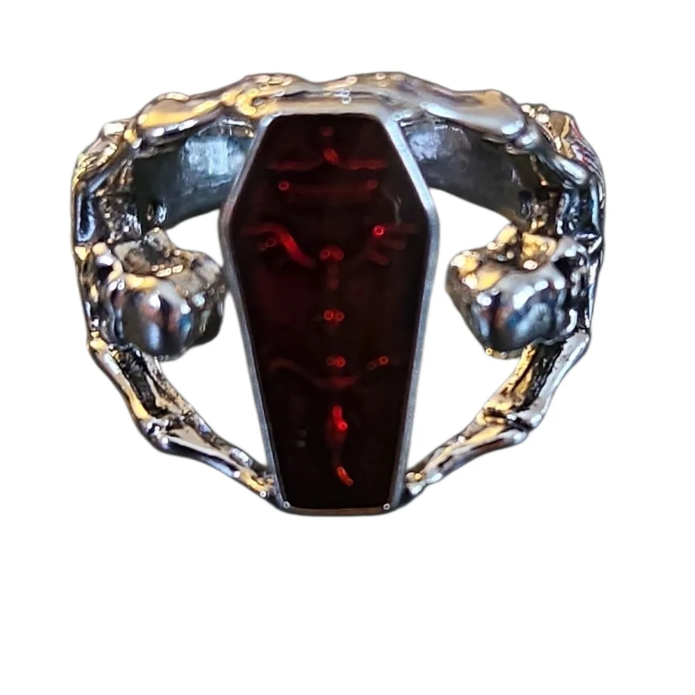 Skeleton Ring with Synthetic Red Zirconia and Alloy Band.